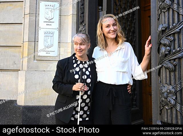 10 September 2021, Berlin: Actress Christina Athenstädt (r) and blind criminal defence lawyer Pamela Pabst on a walk in Berlin Moabit