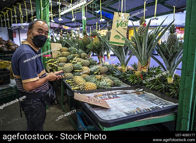 Hawker stalls at Kemyalang Park during the festive Chinese New Year in Kuching, Sarawak, East Malaysia, Borneo, offer a variety of traditional delicacies and...