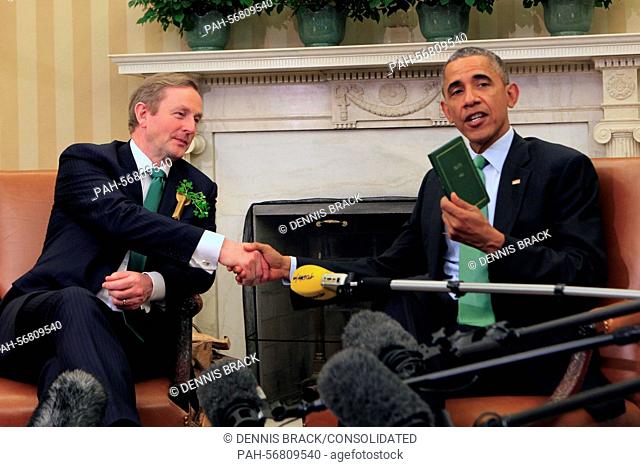 United States President Barack Obama shakes hands with Prime Minister (Taoiseach) Enda Kenny of Ireland in the Oval Office of the White House in Washington, D