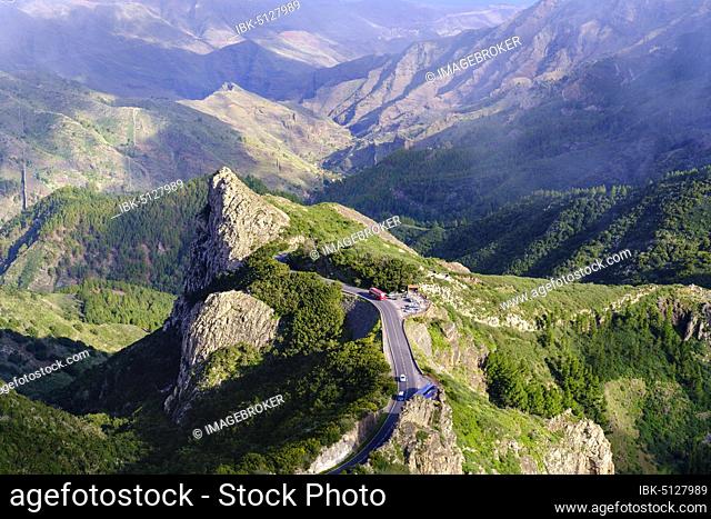 Mountain Roque de la Zarcita with mountain road in Monumento Natural de los Roques, La Gomera, Canary Islands, Spain, Europe