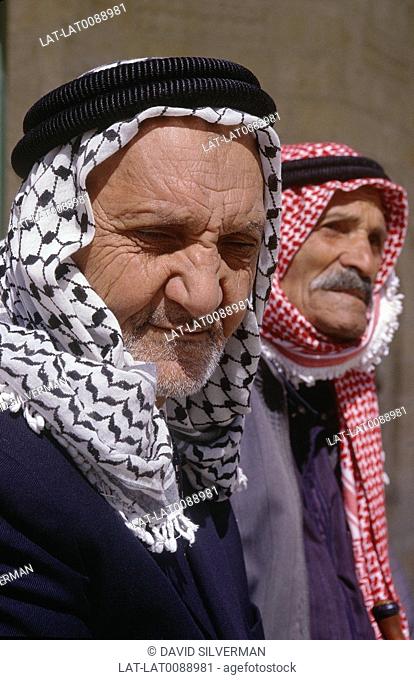 Temple Mount. Two Palestinian men. Traditional Arab headdresses, scarves. Portraits