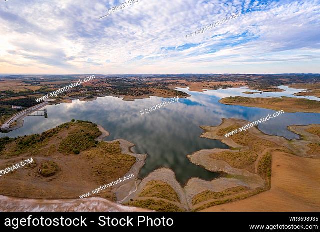 Drone aerial panorama of a dam lake reservoir landscape in Terena, Portugal