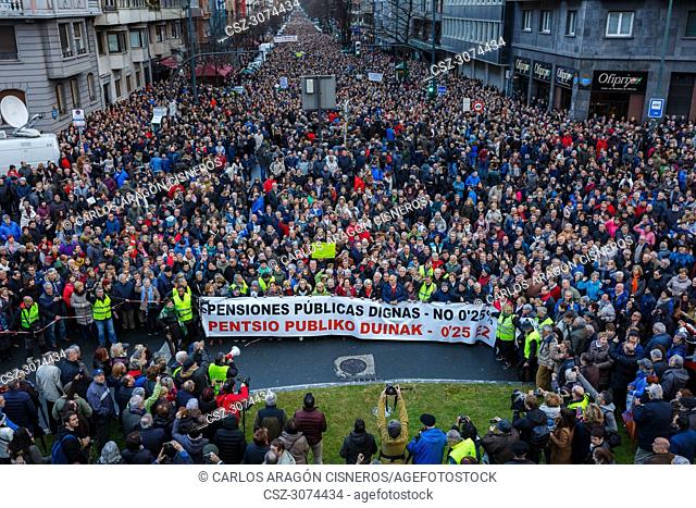 BILBAO, SPAIN - MARCH 17, 2018: Thousands of unidentified people in the protest against the small rise of 0.25% of the pensions of the Government of Mariano...