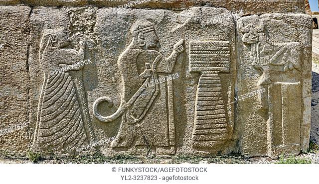 Pictures & Images Hittite relief sculpted orthostat panels of the Sphinx Gate. A king and Queen make offerings to a Bull God