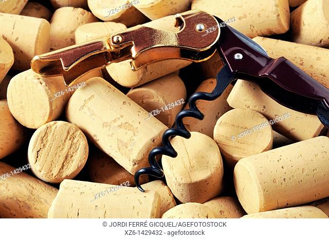 corkscrew over a pile of new corks