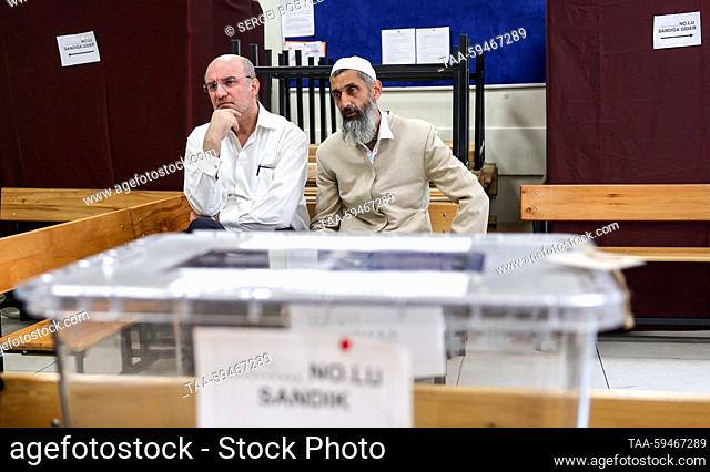 TURKEY, ISTANBUL - MAY 28, 2023: Observers are seen at a polling station in Saffet Cebi Middle School during a runoff between incumbent president Erdogan of...