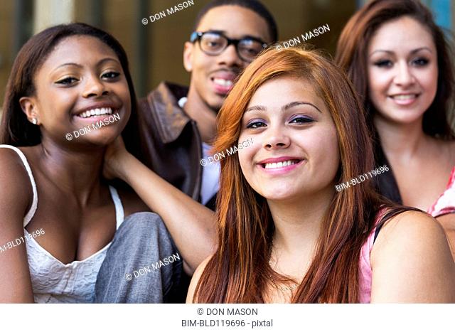 Teenagers smiling outdoors