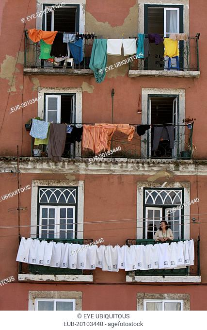 Laundry drying on balconies of a town house in the Alfama district