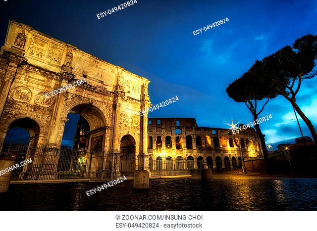 Famous Colosseum and arch of constantine taken at night when the structures are still lit up