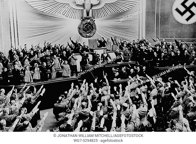 GERMANY Berlin -- Mar 1938 -- Adolf Hitler accepts the ovation of the Reichstag after announcing the 'peaceful' acquisition of Austria