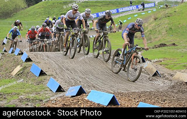 (R-L) Mathieu Van der Poel of Netherlands, Thomas Pidcock of Britain, Nino Schurter of Switzerland and Maximilian Brandl of Germany compete during the men's...