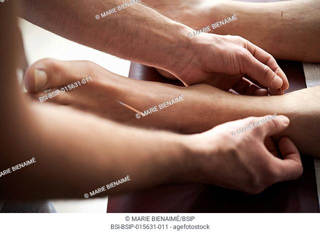 Reportage in a Chinese medicine practice in Lyon, France. Acupuncture session