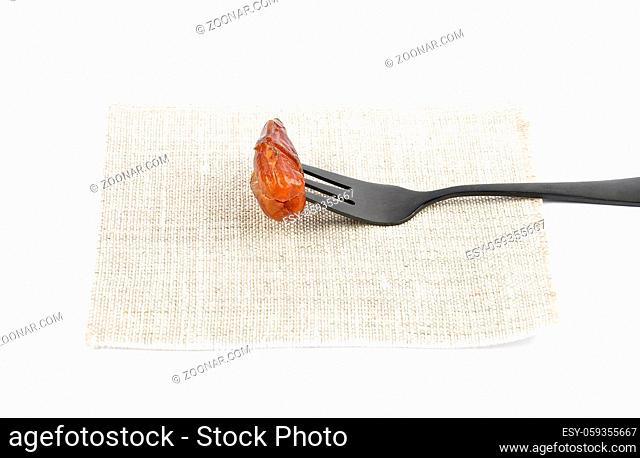 Dattel auf Gabel und Tuch - Date on fork and linen cloth