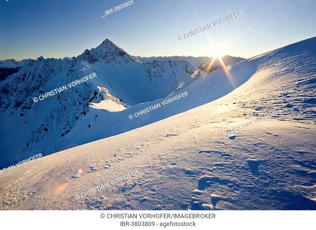 Frozen north face of Reitherspitze Mountain in the last sunlight, Reith bei Seefeld, Karwendel Mountains, Tyrol, Austria