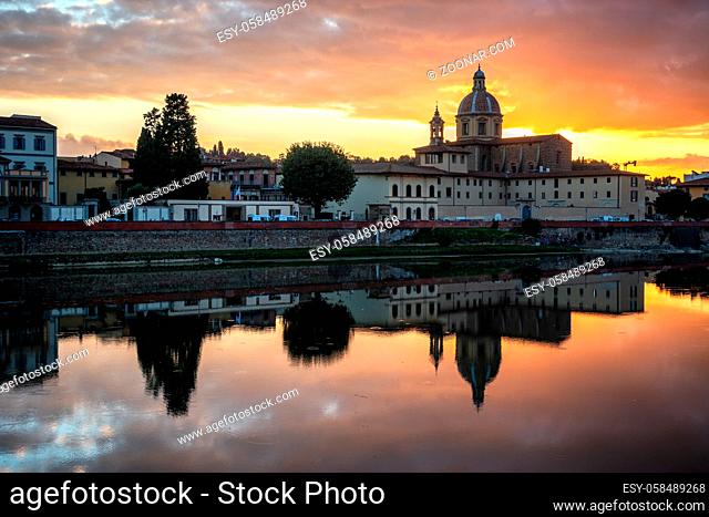 FLORENCE, TUSCANY/ITALY - OCTOBER 19 : View of buildings along the River Arno at dusk in Florence on October 19, 2019