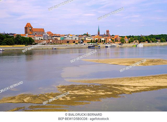 Torun, Kujavian-Pomeranian / Poland - 2018/06/10: Panoramic view of historical district of Torun old town by the Vistula river