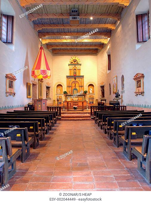 Mission Basilica San Diego de Alcala interior showing altar and pews