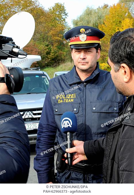 Chief inspector of the Steiermark state police, Wolfgang Braunsar, answers journalists' questions at the Spielfeld refugee camp on the Slovenian-Austrian border