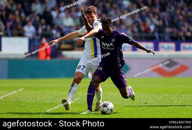 Westerlo's Lukas Van Eeno and Anderlecht's Majeed Ashimeru fight for the ball during a soccer match between RSC Anderlecht and KVC Westerlo