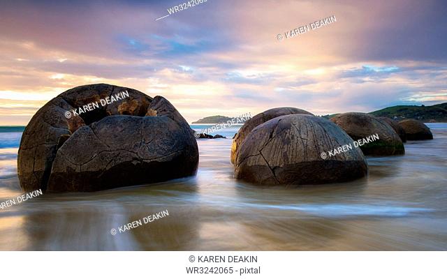 Moeraki Boulders at sunset, Koekohe Beach, Moeraki Peninsula, Otago, South Island, New Zealand, Pacific