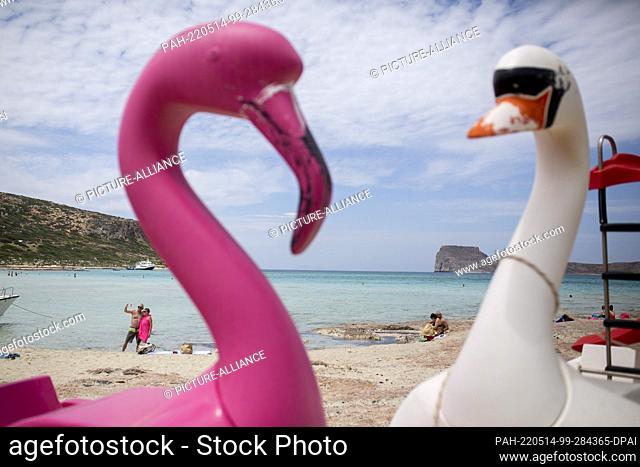 12 May 2022, Greece, Kissamos: Tourists take photos on the beach of Balos in the northeastern part of the island of Crete