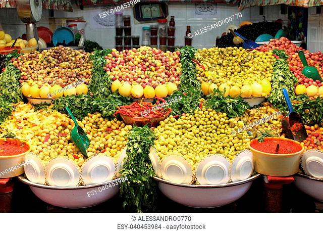 Market stall selling fresh olives in Marrakech, Morocco