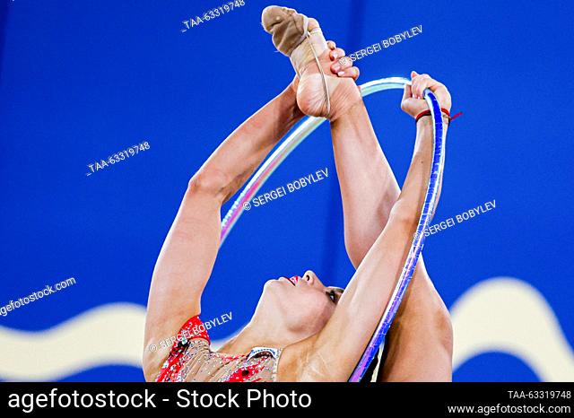 RUSSIA, MOSCOW - OCTOBER 13, 2023: Russia's Vladislava Nikolayenko performs her hoop routine in the individual final at the 2023 Cup of the Strongest...