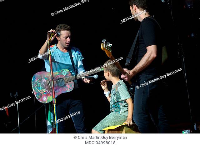 Singer Chris Martin and bassist Guy Berryman, members of Coldplay, in concert at San Siro Stadium during the Head Full of Dreams Tour. Milan, Italy