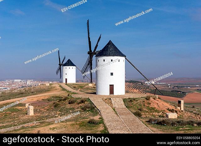 View of the historic the windmills of La Mancha in the hills above San Juan de Alcazar