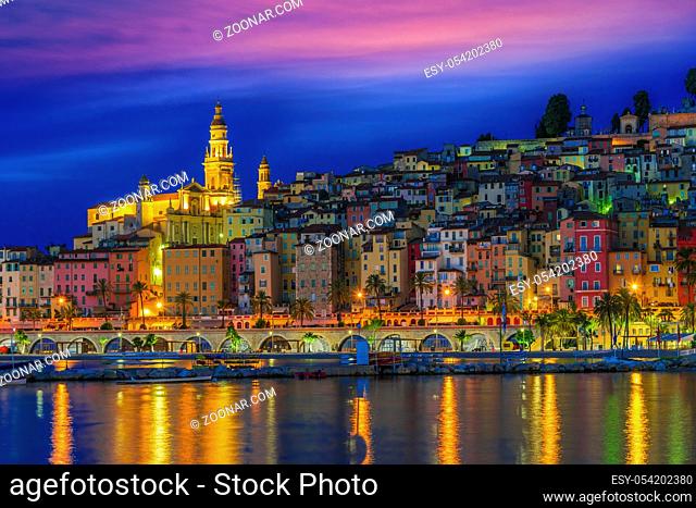 Old town architecture of Menton on French Riviera by night