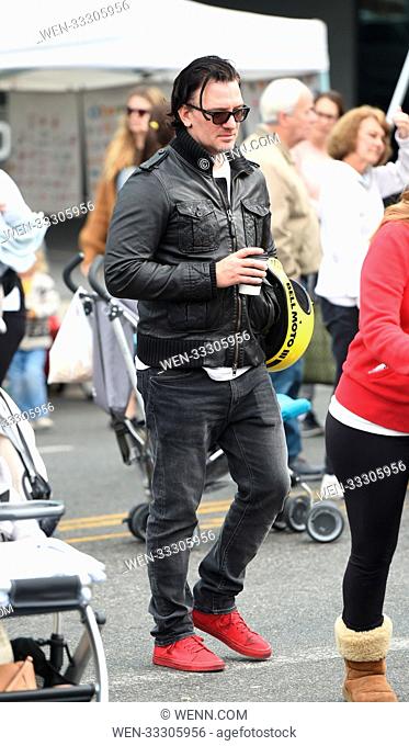 JC Chasez spotted out and about in Los Angeles wearing red shoes and carrying a yellow helmet Featuring: JC Chasez Where: Los Angeles, California