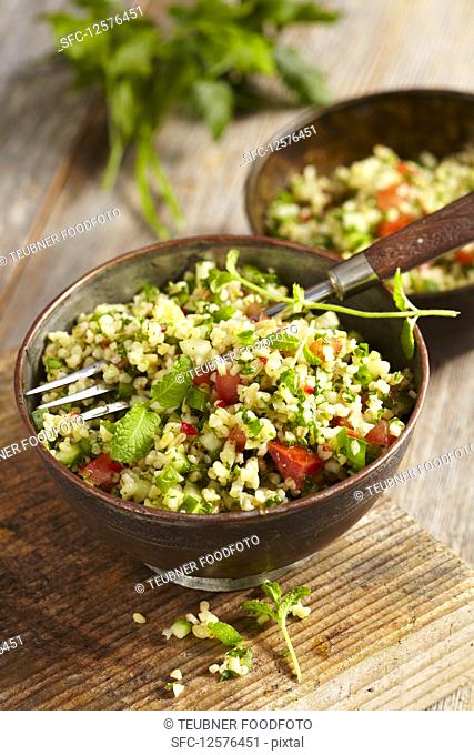 Vegan bulgur salad with parsley and mint