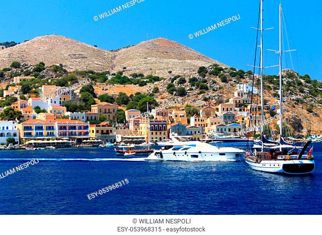 Boats and houses of Simi island in Greece