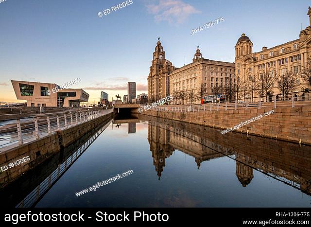 Reflections of The Pier Head on Liverpool waterfront, UNESCO World Heritage Site, Liverpool, Merseyside, England, United Kingdom, Europe