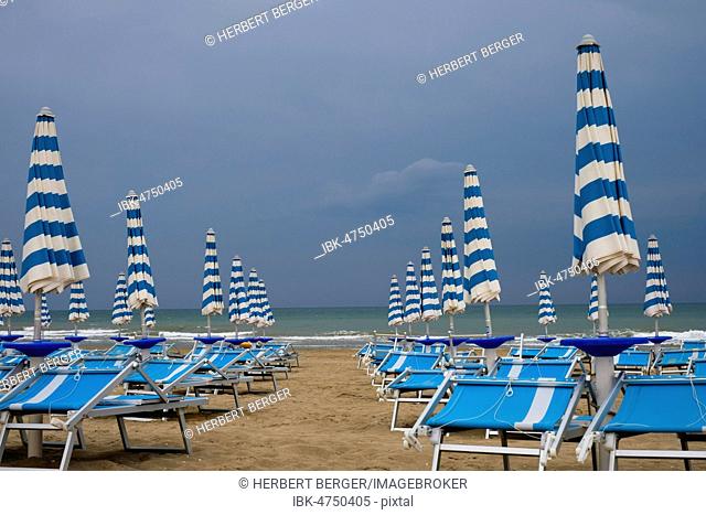 Abandoned beach chairs on the beach, Adriatic sea, Union Lido, Cavallino Treporti, Veneto, Italy