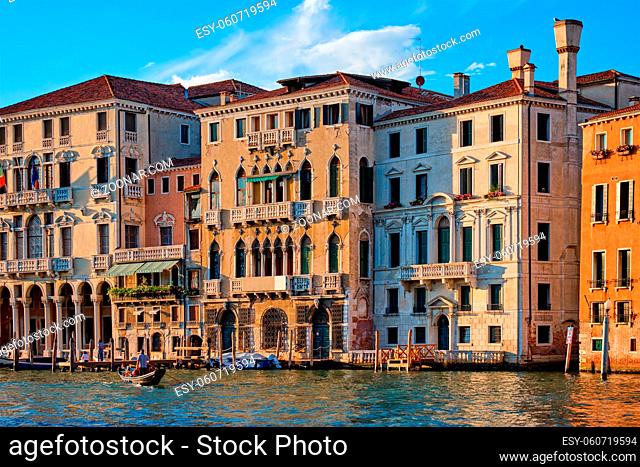 Grand Canal with boats and gondolas on sunset, Venice, Italy