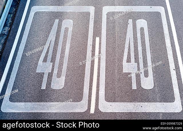 Forty Kilometers or Miles Per Hour Speed Limit Sign in Road Paint. Top view