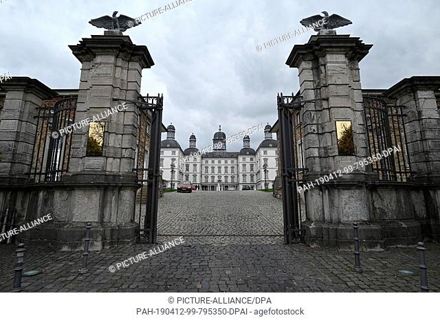 12 April 2019, North Rhine-Westphalia, Bensberg: A gate gives access to the courtyard in front of Bensberg Castle, where there is a hotel