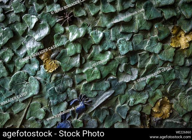 Natural details of leaves and insects made with bronze by the sculptor Etsuro Sotoo on the doors of the Nativity Facade at the Sagrada Familia Basilica...