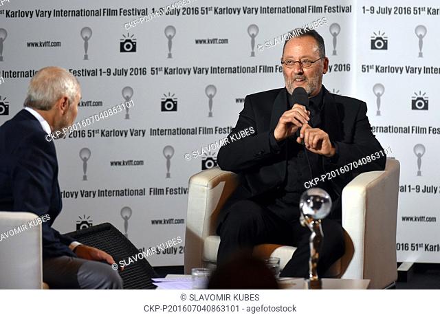 French actor Jean Reno, right, speaks during a talk show of Czech anchorman Marek Eben (left) at the 51st International Film Festival in Karlovy Vary