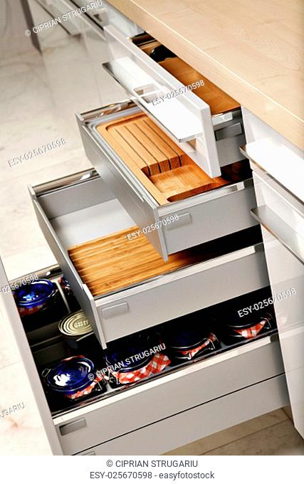 Modern kitchen drawers with compartments for various things