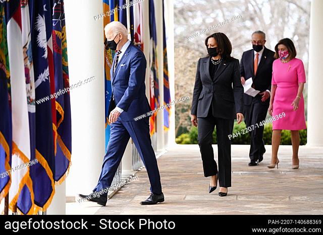 (L-R) US President Joe Biden, Vice President Kamala Harris, Senate Majority Leader Chuck Schumer and Speaker of the House nancy Pelosi arrive to deliver remarks...