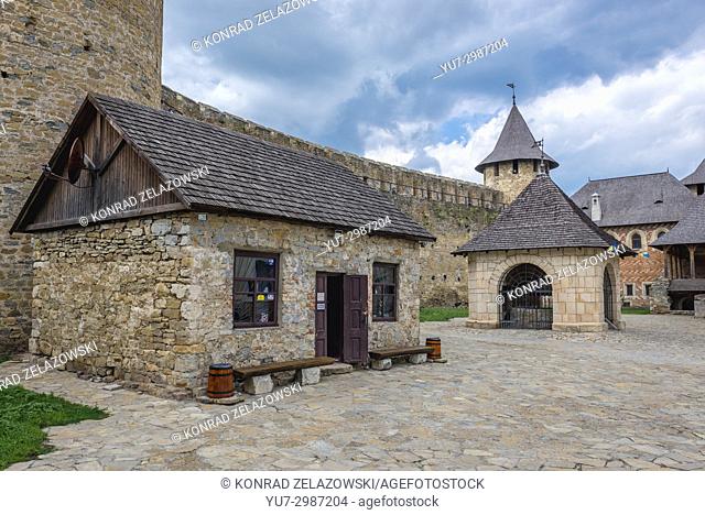 Inner courtyard with covered well and gift shop in Khotyn Fortress, located in Chernivtsi Oblast of western Ukraine