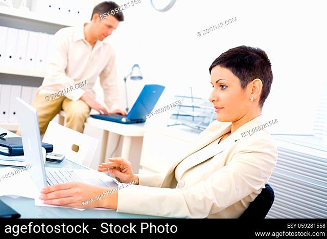 Business couple working at office