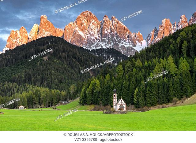 Dolomites Alpenglow above St. Johann Chapel (Chiesetta di San Giovanni) Funes, Italy World Location