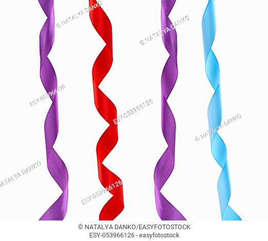 blue, red and purple satin twisted ribbons isolated on white background, close up