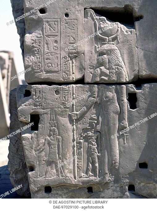 The Goddess Hathor protecting the king, relief, east exterior wall of the Great Hypostyle Hall, Karnak temple complex (Unesco World Heritage List, 1979)