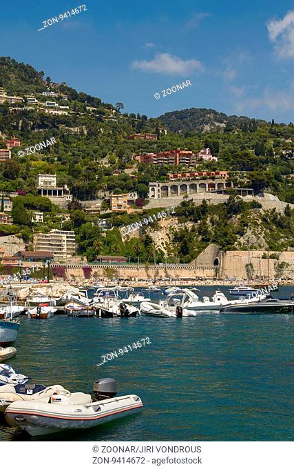 VILLEFRANCHE, FRANCE - JUNE 4, 2010: People Enjoying Luxury Bay and Resort of Cote d'Azur. Villefranche-sur-mer is Located on the French Riviera at...