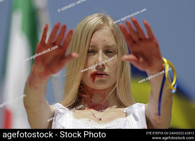 MEXICO CITY, MEXICO - APR 24, 2022: Members of the Ukrainian community in Mexico City, take part during a performance and demonstrated at the Angel of the...