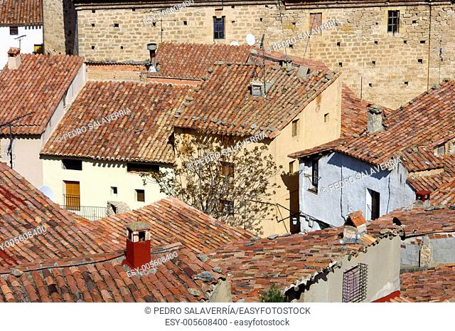 view from above the tiled roofs of a Spanish village, Cuevas de Canart, Teruel, Aragon, Spain